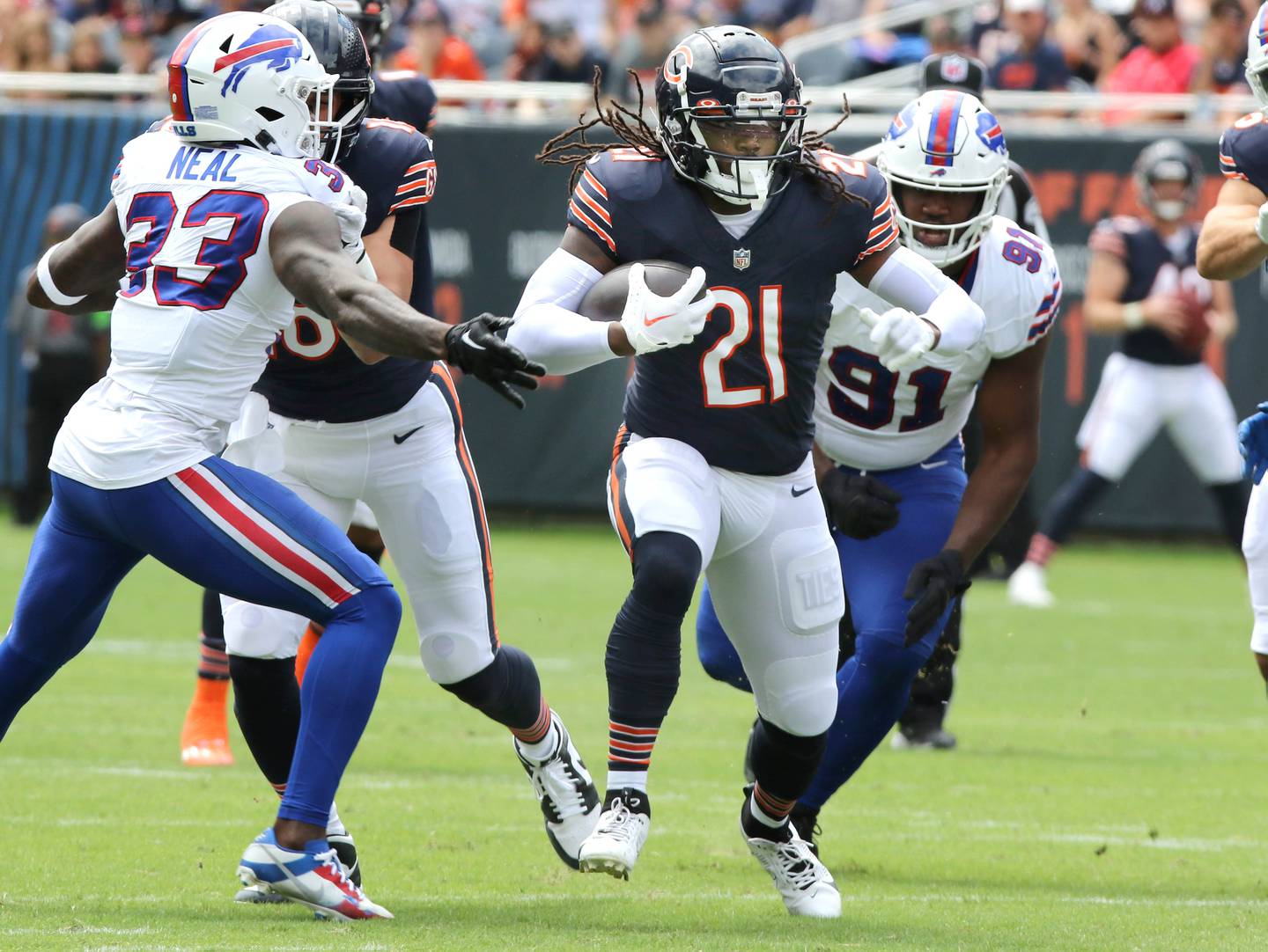 Chicago Bears running back D'Onta Foreman looks to get by Buffalo Bills cornerback Siran Neal during their game Saturday, Aug. 26, 2023, at Soldier Field in Chicago.