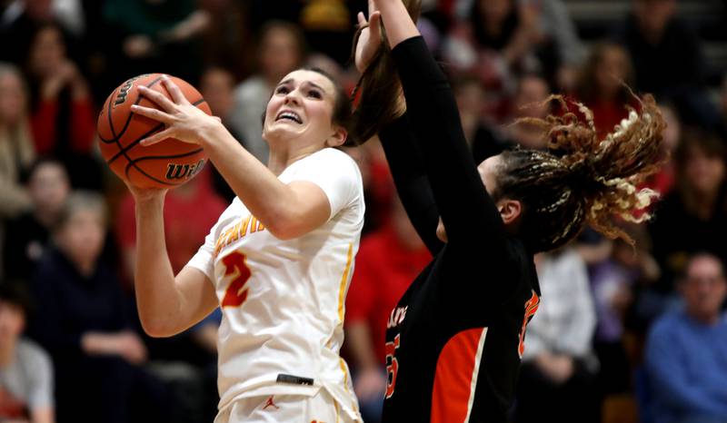 Batavia’s Brooke Carlson goes in for a shot during a Class 4A Batavia Sectional semifinal game against St. Charles East on Tuesday, Feb. 20, 2024.