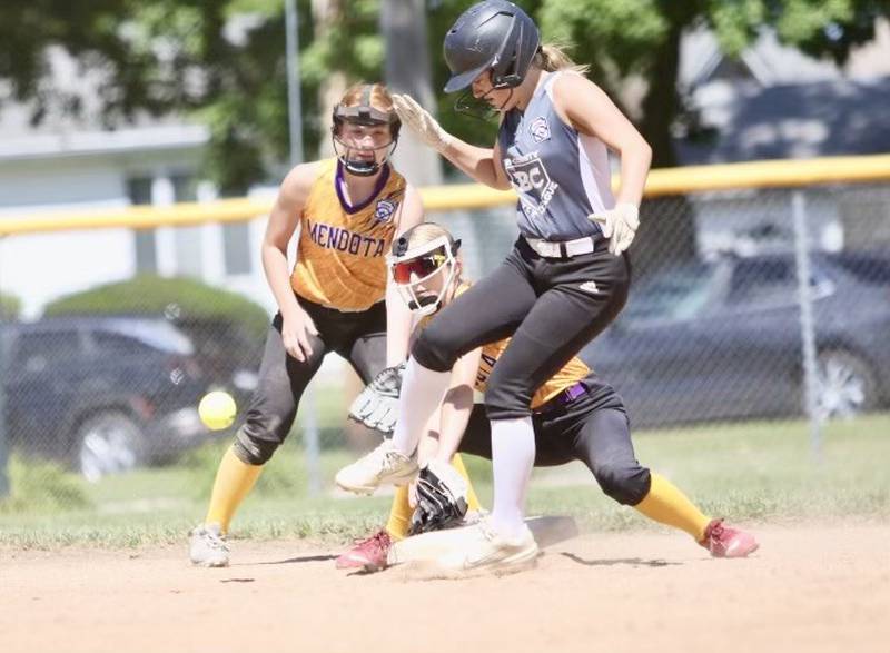 Bi-County's Eden Carlson steals second base in Sunday's District 20 Junior League Softball championship game against Mendota at Sunset Park in Peru. Bi-County repeated as district champions with a 14-9 win.
