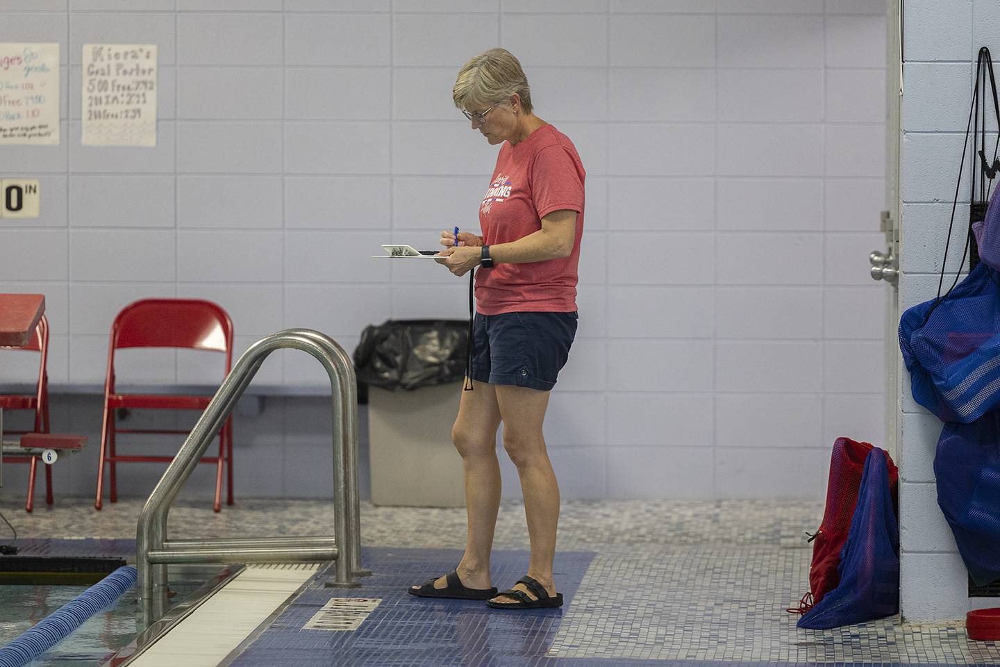 Morrison swim coach Tracy Henson works against Sterling Wednesday, Aug. 28, 2024 at Morrison High School.