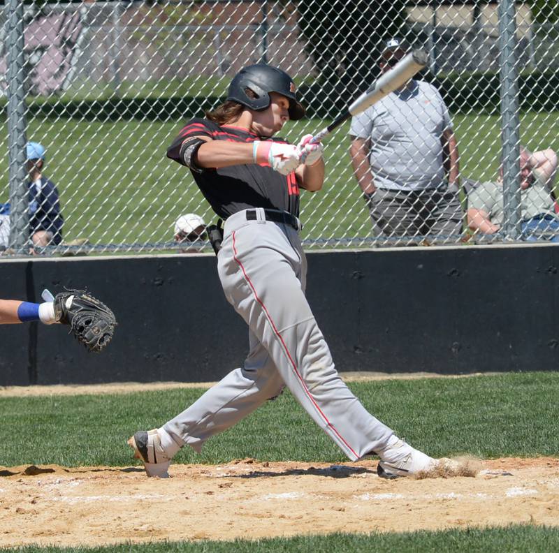 Forreston's Carson Akins connects for a double during the 1A sectional championship game with East Dubuque on Saturday, May 25, 2024 at Forreston High School.