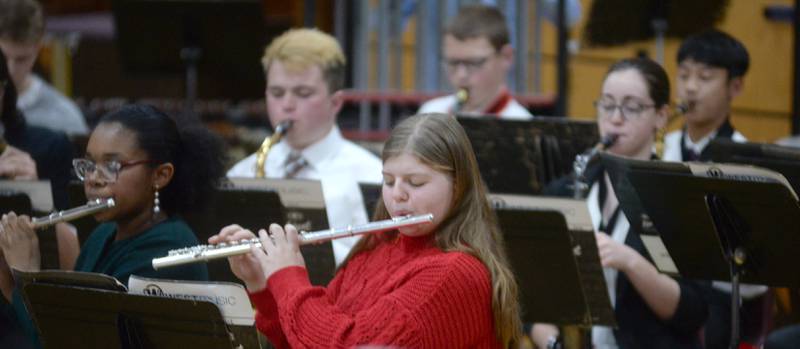 Nicole Girton and Aralin McClain play flutes during Oregon High School's Christmas Concert on Sunday, Dec. 17, 2023.. The afternoon event was held in the OHS Music Room and also included performances by the OHS Choir.