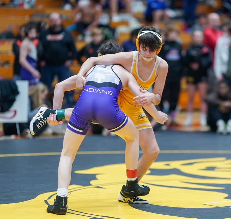 Jacobs’ Kristian DeClercq (right) fights for position against Hononegah’s Rocco Cassioppi In a 106-pound championship match during The Clint Arlis Invitational Wrestling meet at Batavia High School in Batavia on Saturday, Jan 13, 2024.