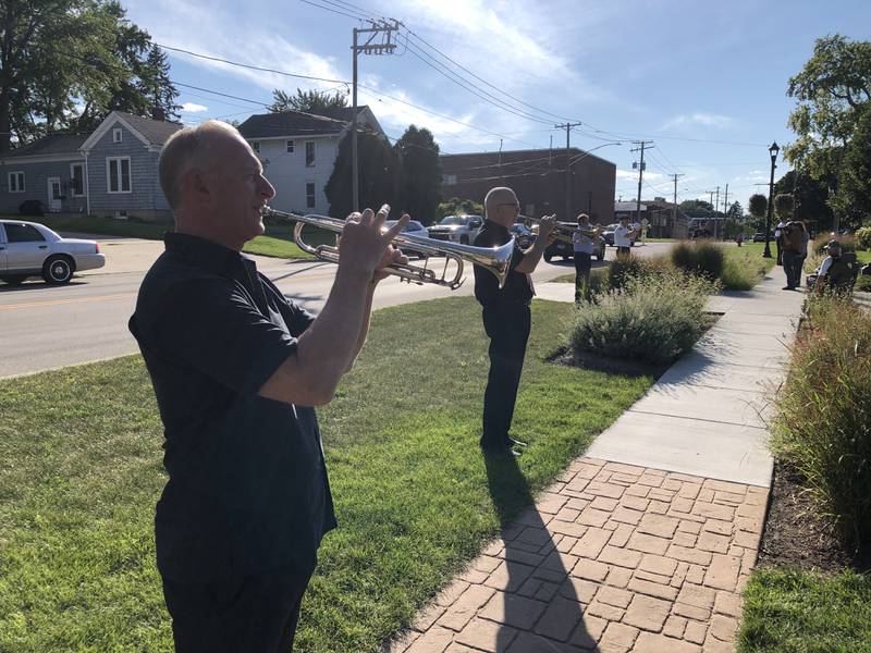 Four buglers played taps on Sunday, Aug. 11, 2024, at McHenry's Veteran's Park as part of the annual Keep the Spirit of '45 Alive event honoring World War II and Korean War veterans.