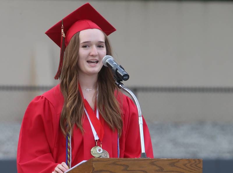 La Salle-Peru Township High School valedictorian Faith Arkins delivers a speech during the 126th annual commencement graduation ceremony on Thursday, May 16, 2024 in Howard Fellows Stadium.