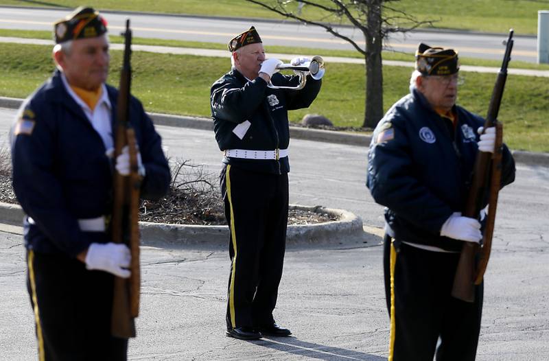 John Widmayer, of the Woodstock Veterans of Foreign Wars Post 5040 Honor Guard, listens as the names of McHenry County veterans who died in the Vietnam War during the “Voices from Vietnam,” program on Friday, March 29, 2024, at the McHenry County Government Administration Building in Woodstock. The program was the first time that McHenry County honored Vietnam veterans on Vietnam War Veterans Day. The day, that was created by federal law enacted in 2017, honors the more than 2.7 million American men and women who served in Vietnam.