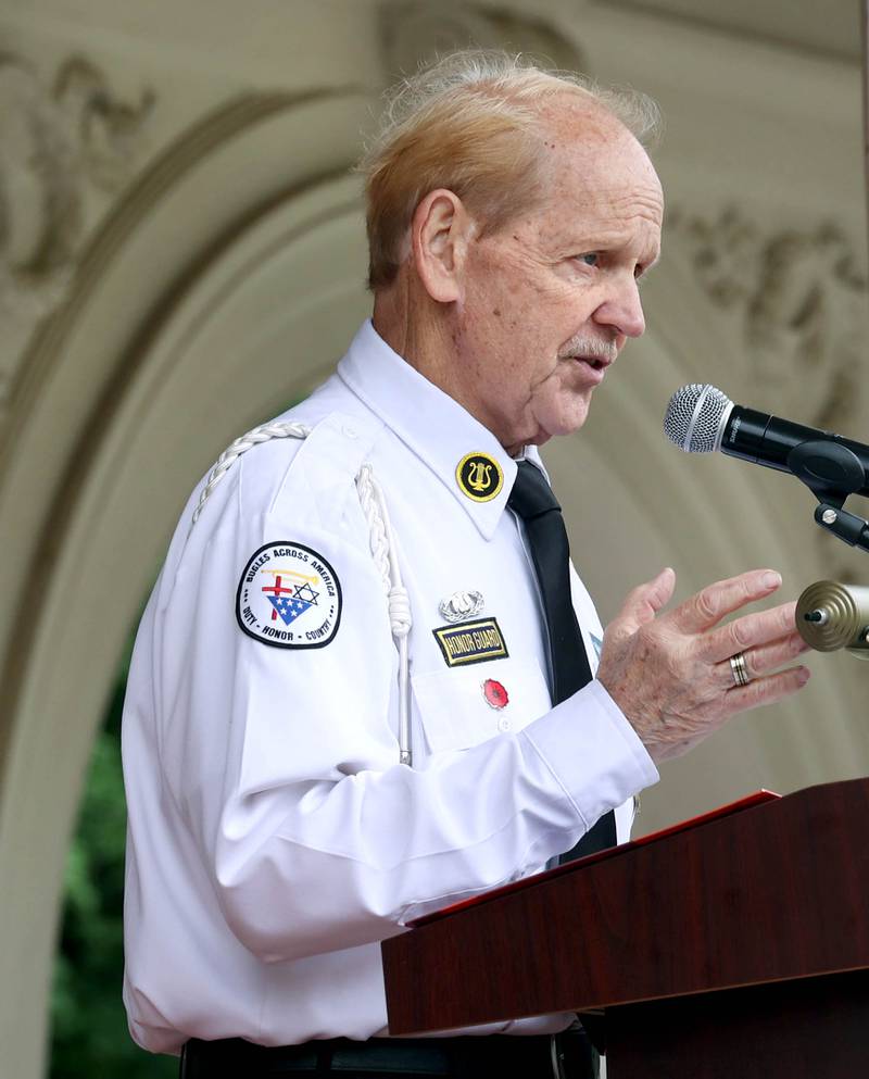 Master of ceremonies Michael Embrey speaks Monday, May 27, 2024, during the DeKalb Memorial Day program at Ellwood House.