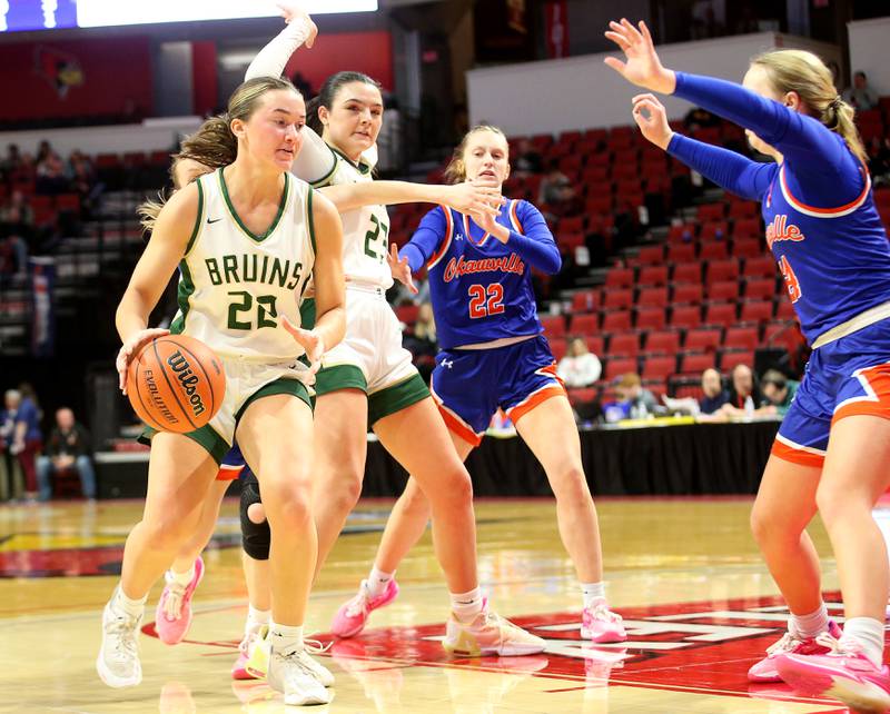 St. Bede's Ella Hermes cuts into the lane as Okawville's Madisyn Wienstroer defends during the Class 1A State semifinal game on Thursday, Feb. 29, 2024 at CEFCU Arena in Normal.