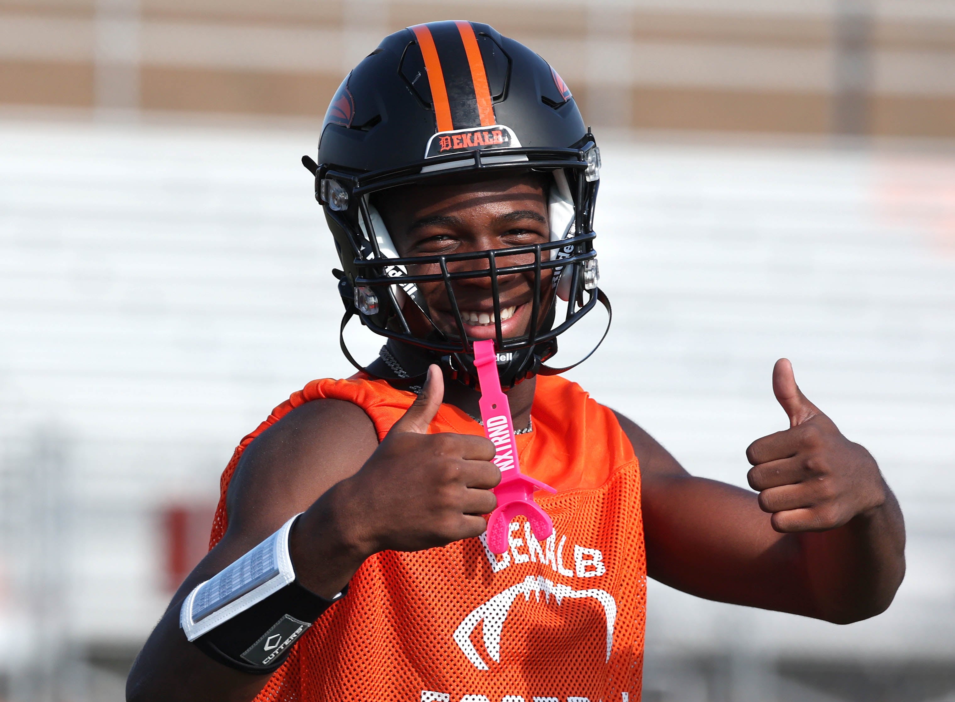 Dekalb’s Davon Grant gives a thumbs up Monday, Aug. 12, 2024, at the school during the first practice of the regular season.