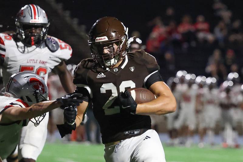 Joliet Catholic’s Nate Magrini runs in for the touchdown against Iowa City on Friday, August 30, 2024 in Joliet.