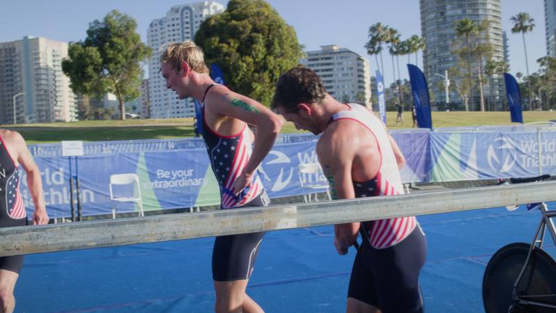 USA Paralympian Owen Cravens races with his guide at the 2023 Long Beach Paratriathlon. Cravens won the paratriathlon and is the subject of a documentary "Looking Forward."