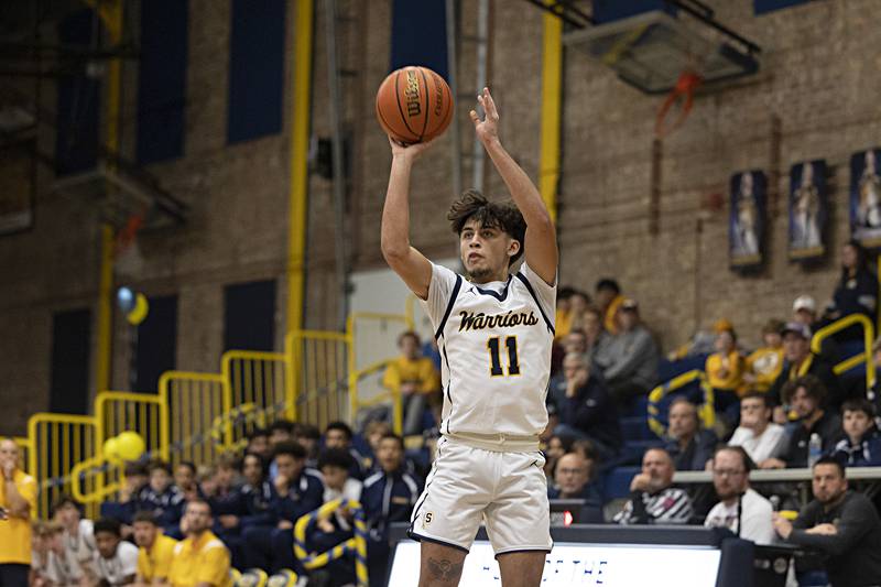 Sterling’s Nico Battaglia puts up a shot against Moline Friday, Dec. 1, 2023 in Sterling.