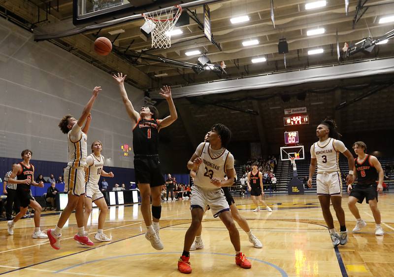 McHenry's Marko Visnjevac tries to grab a rebound during the IHSA Class 4A Guilford Boys Basketball Sectional semifinal game against Hononegah on Wednesday, Feb. 28, 2024, at Rock Valley College in Rockford.