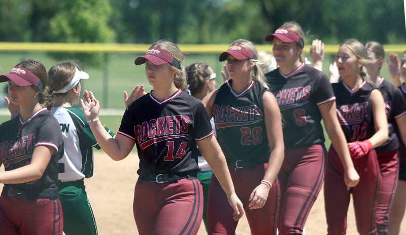 Richmond-Burton’s Rockets greet North Boone’s Vikings after Class 2A softball sectional final action at Marengo Saturday.