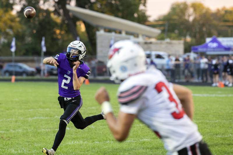 Dixon’s Cullen Shaner fires a pass for a TD against Stillman Valley Friday, Aug. 30, 2024 at Dixon High School.