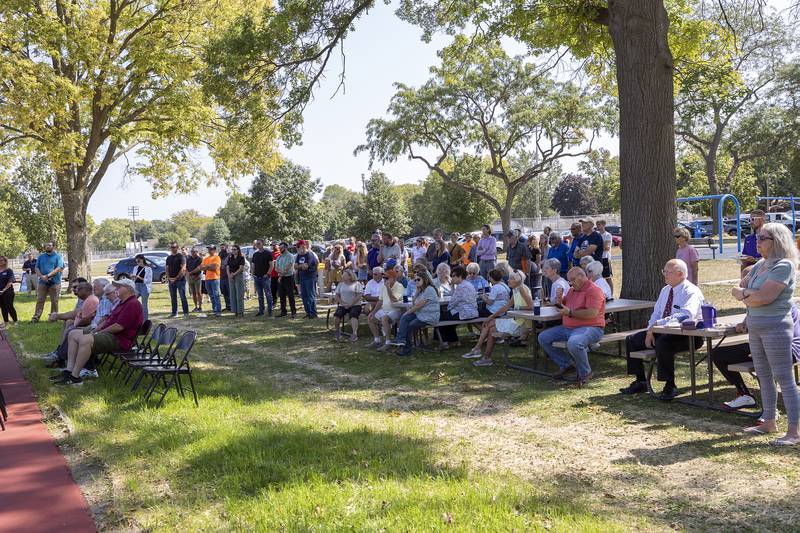 Community members attend the dedication Tuesday, Sept. 17, 2024, of the Larry and Louise Reed Basketball Courts at Vaile Park in Dixon.