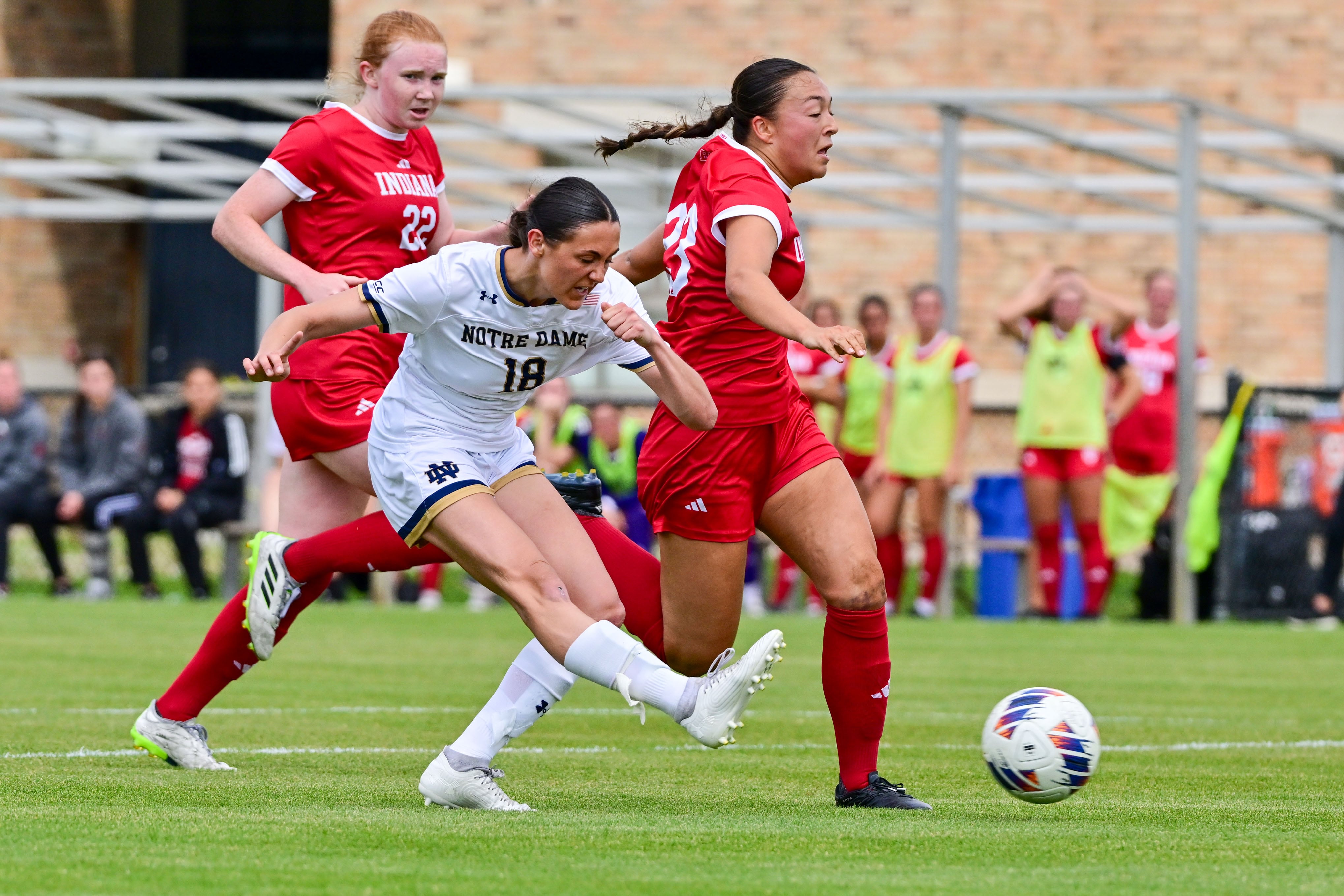 Dundee-Crown alumna Berkley Mensik (18) moves the ball against Indiana players during an exhibition game this spring. Mensik is set to make her return to the pitch this fall after undergoing double-knee surgery last year. Photo courtesy Matt Cashore/Notre Dame Athletics