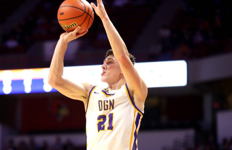 Downers Grove North’s Jack Stanton shoots the ball during the Class 4A Normal Supersectional game against Normal Community.