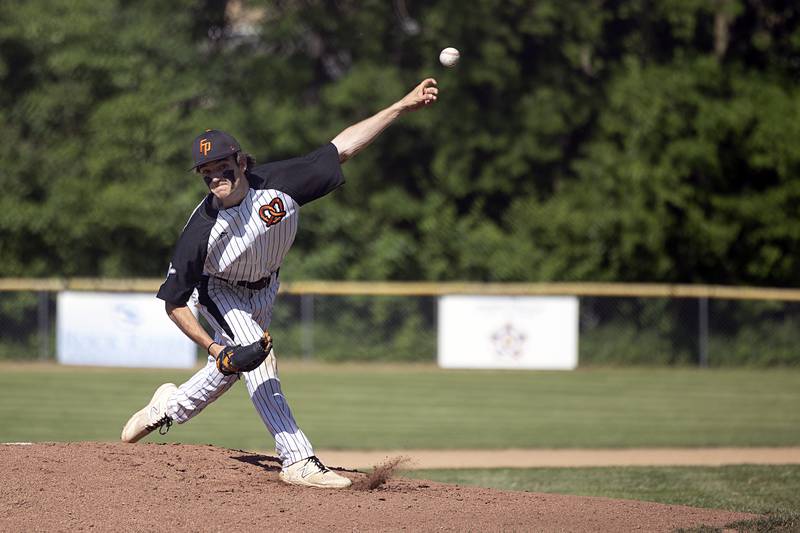 Freeport’s Zachary Arnold fires a pitch against Dixon Thursday, May 23, 2024 during the Class 3A regional semifinal in Dixon.