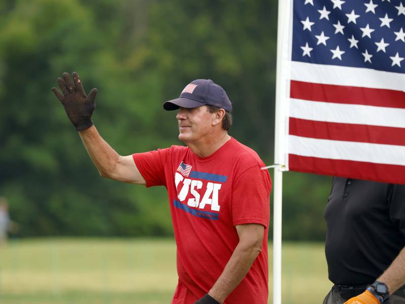 Rudy Keller oversees the set up for the Field of Honor, a display of 2,024 American flags arranged in 25 neat rows Saturday, June 29, 2024 at Seven Gables Park in Wheaton. Keller has been putting up flag installations around DuPage County for years.