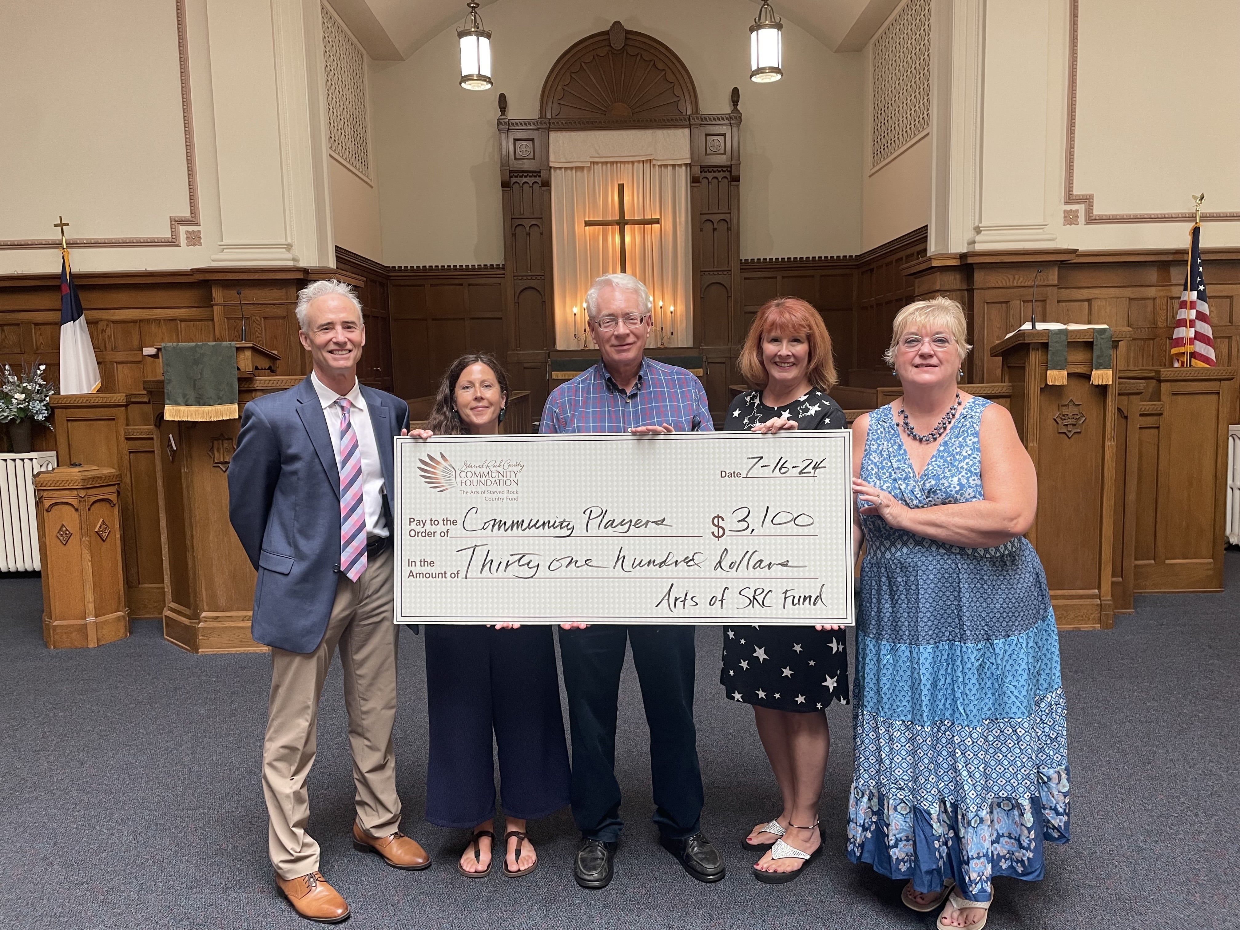 Community Players of Streator recently received a $3,100 Arts of Starved Rock Country grant for its August production of “Newsies” at Engle Lane Theatre. Pictured are (from left) SRCCF President Fran Brolley; Arts of Starved Rock Country Fund Administrator René Parks Wendinger; SRCCF board chair Reed Wilson; Community Players President Kathy Missel; and Vice President Kathy Hepner.