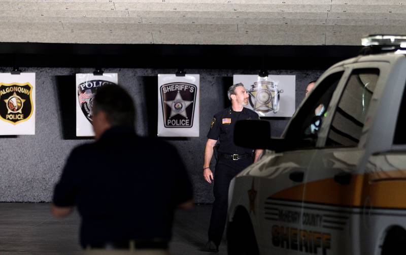 People check out the firing range during an open house at The McHenry County Regional Training Center in Cary Tuesday evening.