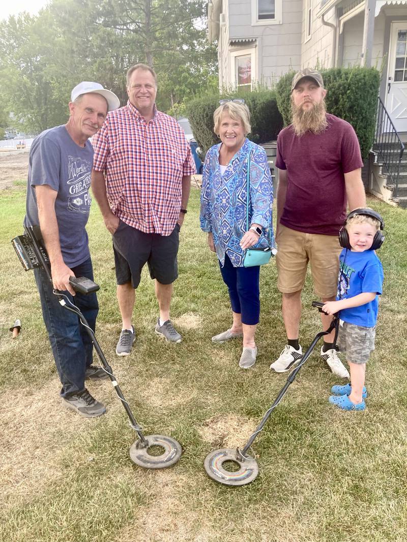 boyfriend, future husband Larry Isaacson.  Her "miracle ring" that was found after 62 years thanks to the help of Tim and Ryan Manahan of Princeton and their metal detectors. Pictured are Tim Manahan (left), John Isaacson, her son, Janice, Ryan Manahan and Lincoln Manahan.