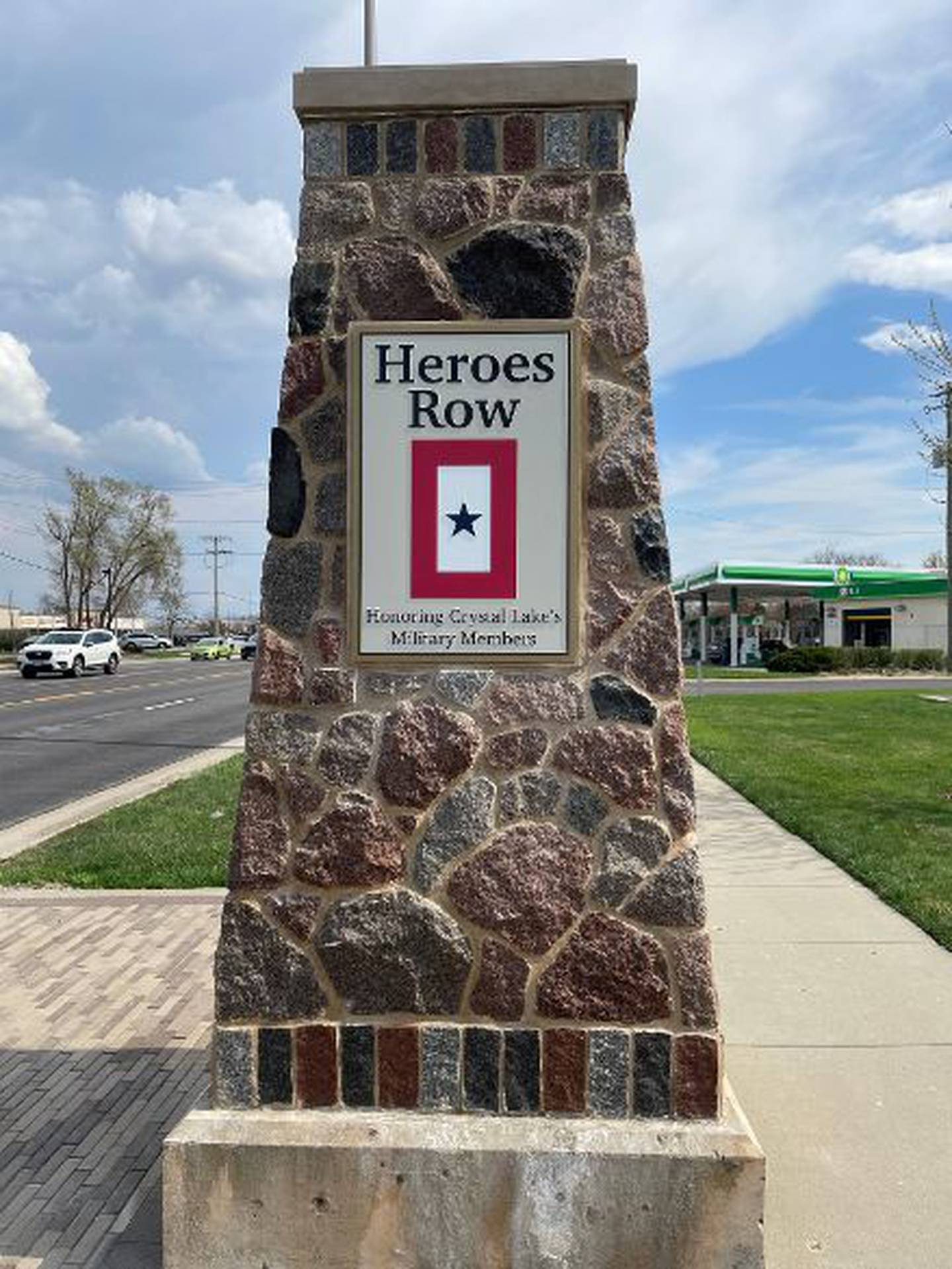 The newly installed plaques from the Blue Star Banner Program along Route 14 in Crystal Lake have dedicated the stretch of highway as Heroes Row.