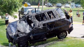 Man dies after SUV strikes curb and goes into retention pond in Wauconda