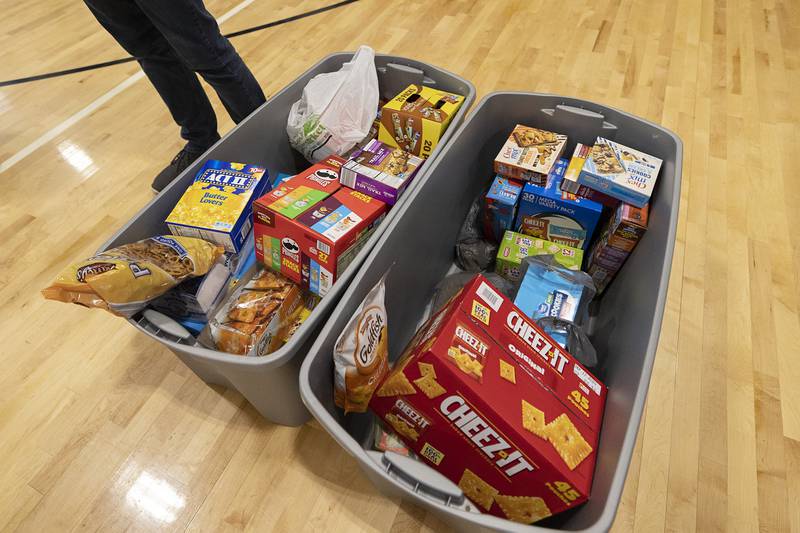 Snack items include popcorn, chips, granola bars and pretzels.