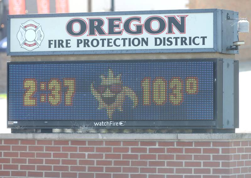 Temperatures climbed to triple digits on Wednesday afternoon as evidenced by the Oregon Fire Protection District's sign on W. Washington Street. The sign is located in the fire station's parking lot.