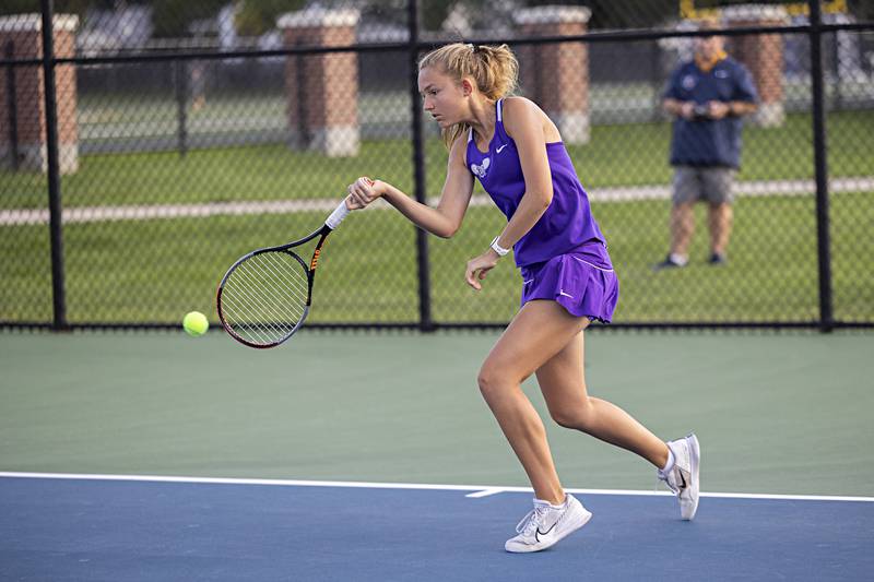 Dixon's Grace Ferguson plays a shot against Sterling's Ellie Aitken Thursday, Sept. 28, 2023.