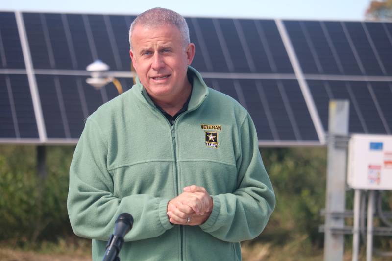 DeKalb Mayor Cohen Barnes speaks Oct. 10, 2023 at a ribbon cutting ceremony in DeKalb to celebrate the activation of two community solar installation projects.