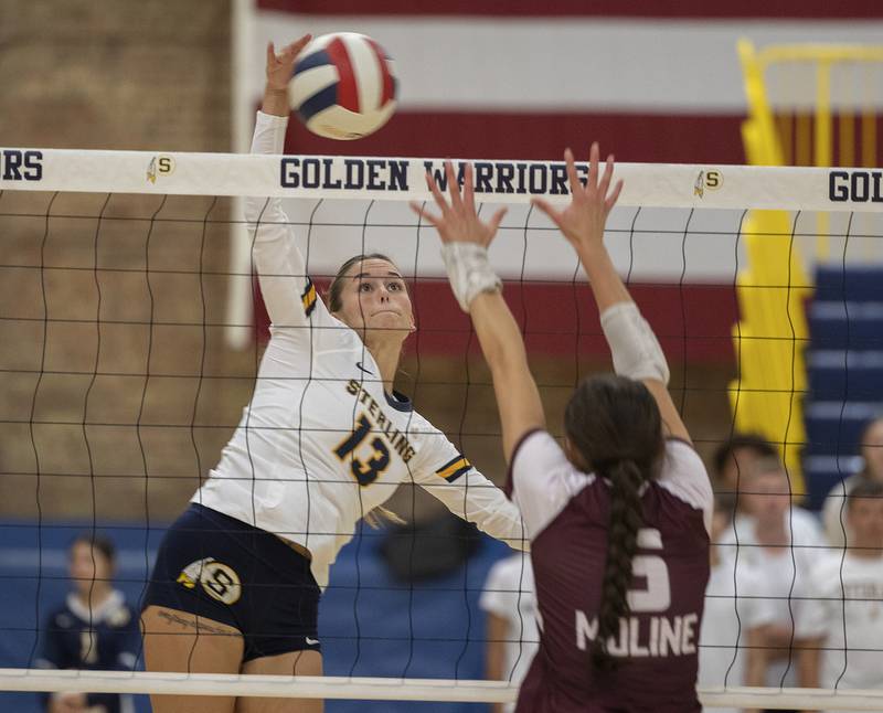 Sterling’s Marley Sechrest hammers the ball Tuesday, Sept. 10, 2024, against Moline.