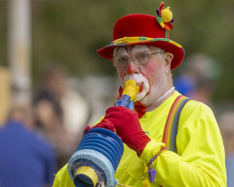 Normal the Clown performed along the parade route and near the children activities area Saturday, June 8, 2024, during Buffalo Days in La Moille.