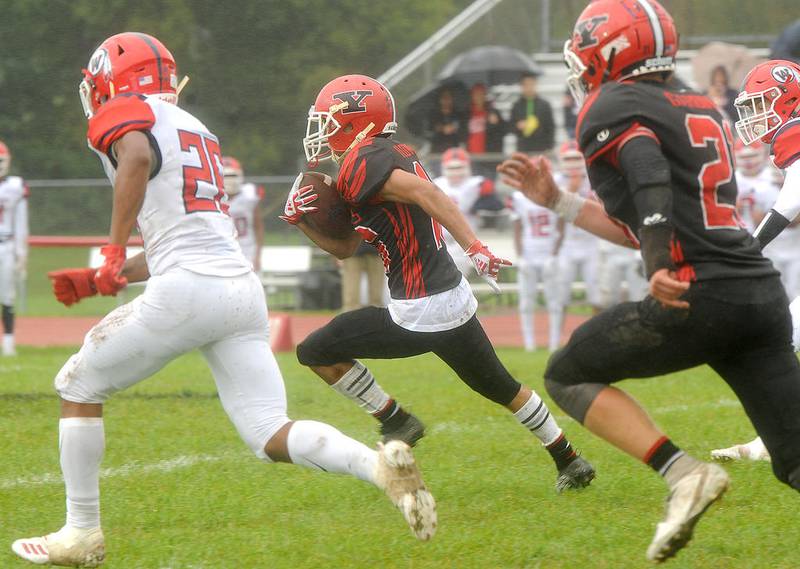 Yorkville receiver Kory Flowers returns a West Aurora kick off past mid field during the varsity homecoming football game at Yorkville High School on Sept. 28.