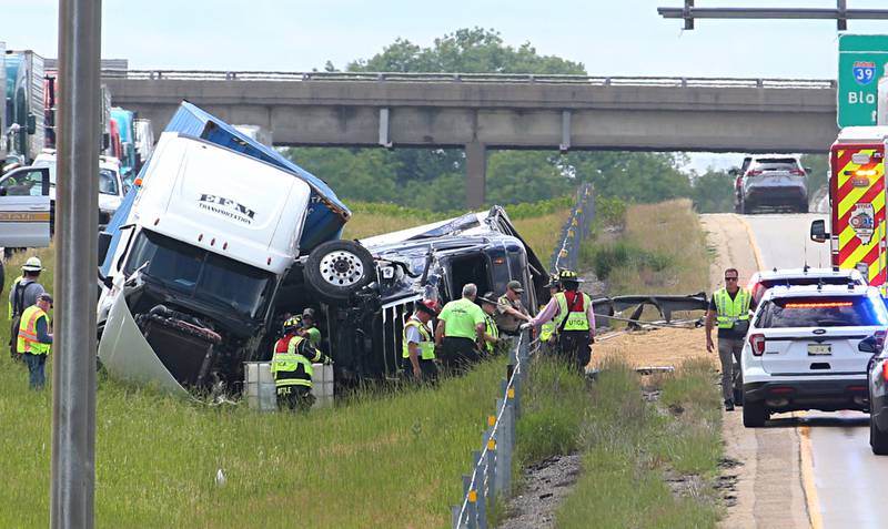 Crews work the scene of a multiple semi truck crash in the eastbound lane of Interstate 80 near the Interstate 39 interchange on Tuesday, May 28, 2024 near Utica. La Salle and Utica Fire and EMS along with Illinois State Police responded to the accident around 12:20p.m. on Interstate 80. Multiple patients were transported to area hospitals.