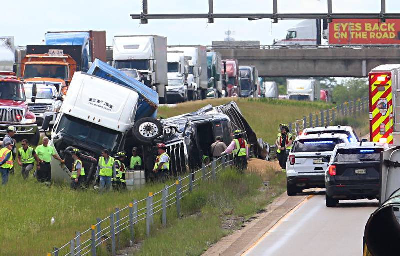 Crews work the scene of a multiple semi truck crash in the eastbound lane of Interstate 80 near the Interstate 39 interchange on Tuesday, May 28, 2024 near Utica. La Salle and Utica Fire and EMS along with Illinois State Police responded to the accident around 12:20p.m. on Interstate 80. Multiple patients were transported to area hospitals.