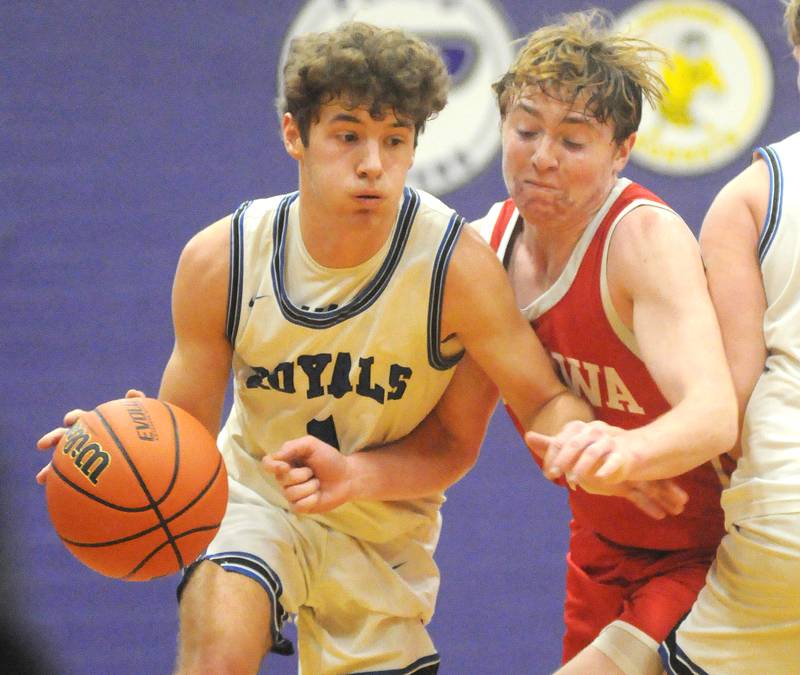 Hinckley-Big Rock's Tyler Smiths tries to manuever past Ottawa's Evan Snook in the Plano Christmas Classic on Wednesday, Dec. 27, 2023.