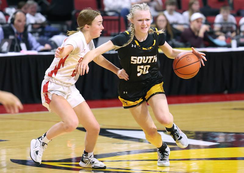 Hinsdale South's Sloane Kiefer tries to go by Glenwood's Rowann Law during their game Friday, March 1, 2024, in the IHSA Class 3A state semifinal at the CEFCU Arena at Illinois State University in Normal.