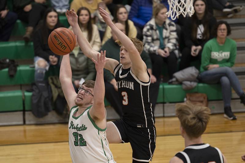 Rock Falls’ Chevy Bates and Byron’s Carson Buser work for a rebound Friday, Jan. 6, 2023.