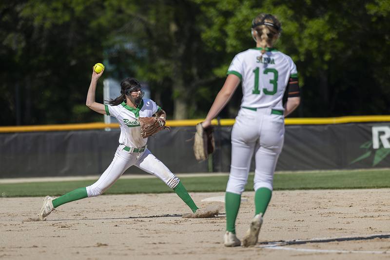 Rock Falls’s Katrina Lecaj throws to first for an out against Princeton Wednesday, May 15, 2024 a the Class 2A regional softball semifinal.