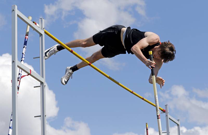 Crystal Lake Central ’s Sam Schroll pole vaults Friday, April 21, 2023, during the McHenry County Track and Field Meet at Cary-Grove High School.