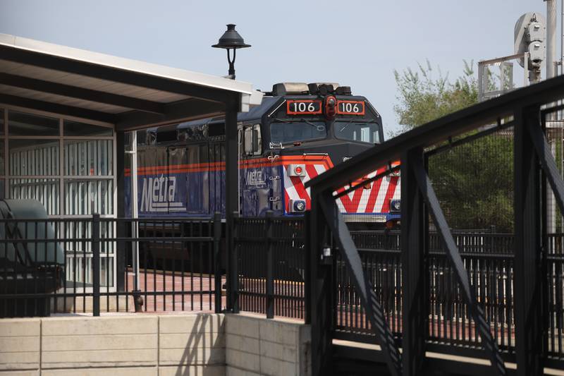 A Metra train waits to depart at the Joliet Gateway Center station on Thursday, May 11, 2023 in Joliet.