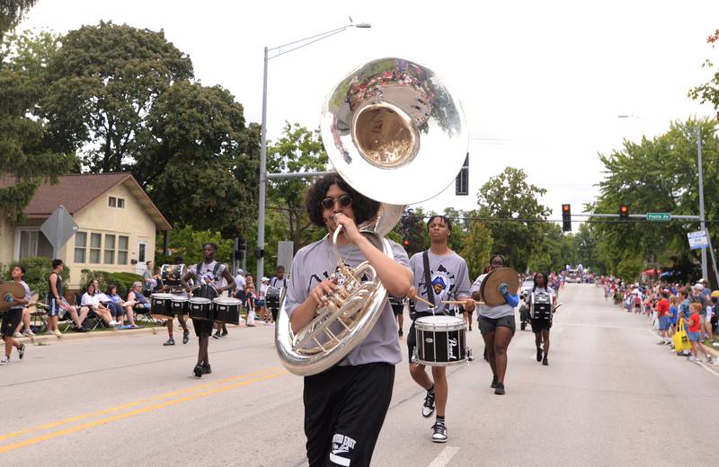 Members of the Proviso East marching band perform during the Downers Grove Fourth of July Parade on Thursday, July 4, 2024.