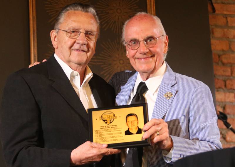 Ted Schmitz poses for a photo with emcee Lanny Slevin during the Illinois Valley Sports Hall of Fame awards banquet on Thursday, June 6, 2024 at the Auditorium Ballroom in La Salle.