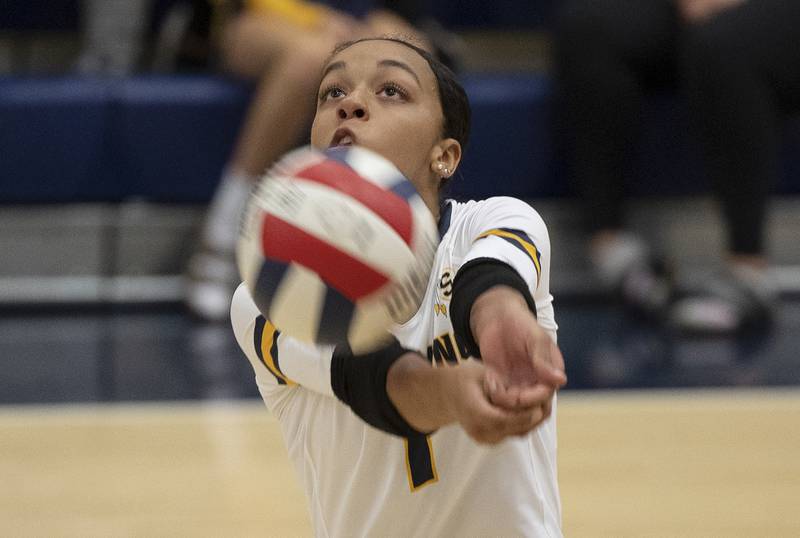 Sterling’s Nia Harris passes the ball Tuesday, Sept. 10, 2024, against Moline.