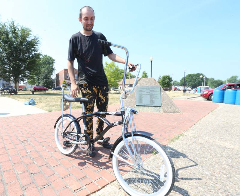 Eric Hernandez of West Brooklyn, wheels his Hero bicycle during the inaugural Bike Fest on Saturday, June 24, 2023 at Rotary Park in Princeton.