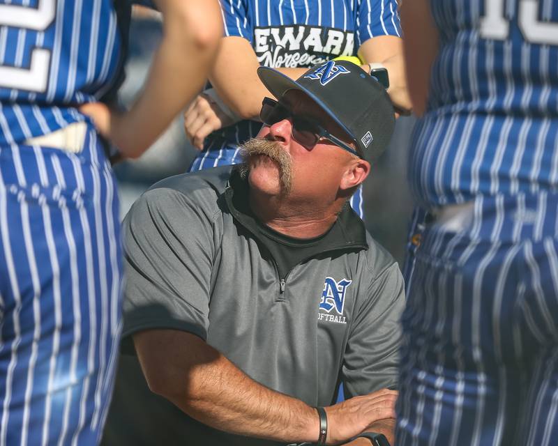 Newark's head coach Jon Wood addresses the team in between innings during Class 1A Newark Regional final game between St. Edwards at Newark. May 17th, 2024.