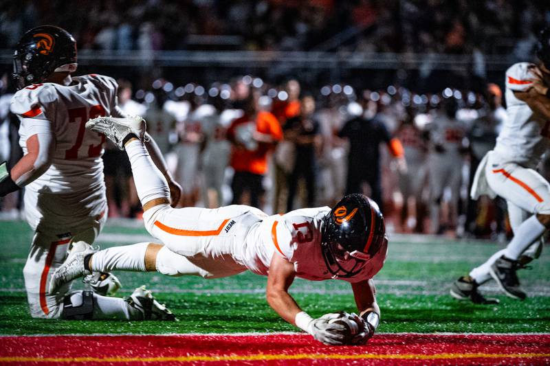Lincoln-Way West's Joey Campagna dives into the endzone during a game on Friday Sept. 15, 2023 at Lincoln-Way Central High School in New Lenox